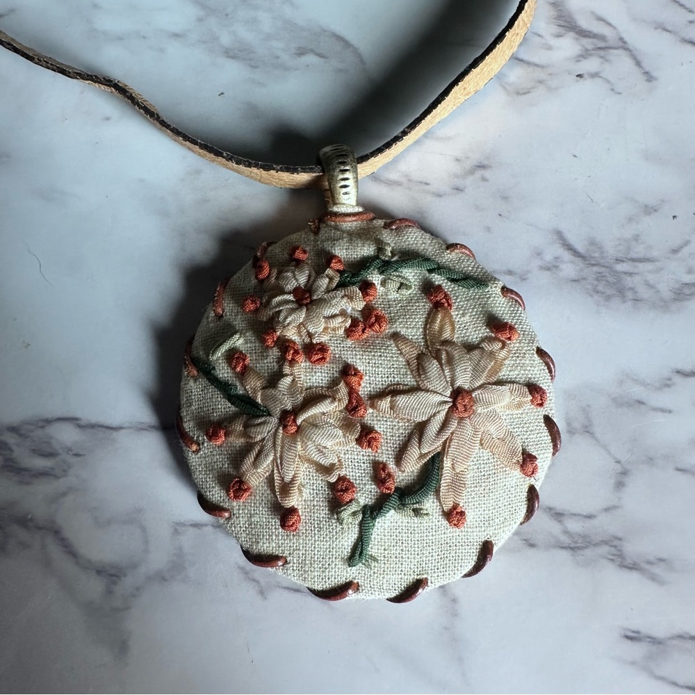 Leather and fabric embroidered necklace